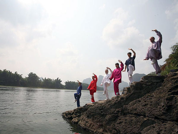 Join in the authentic Taiji lesson in Guilin riverside in the morning